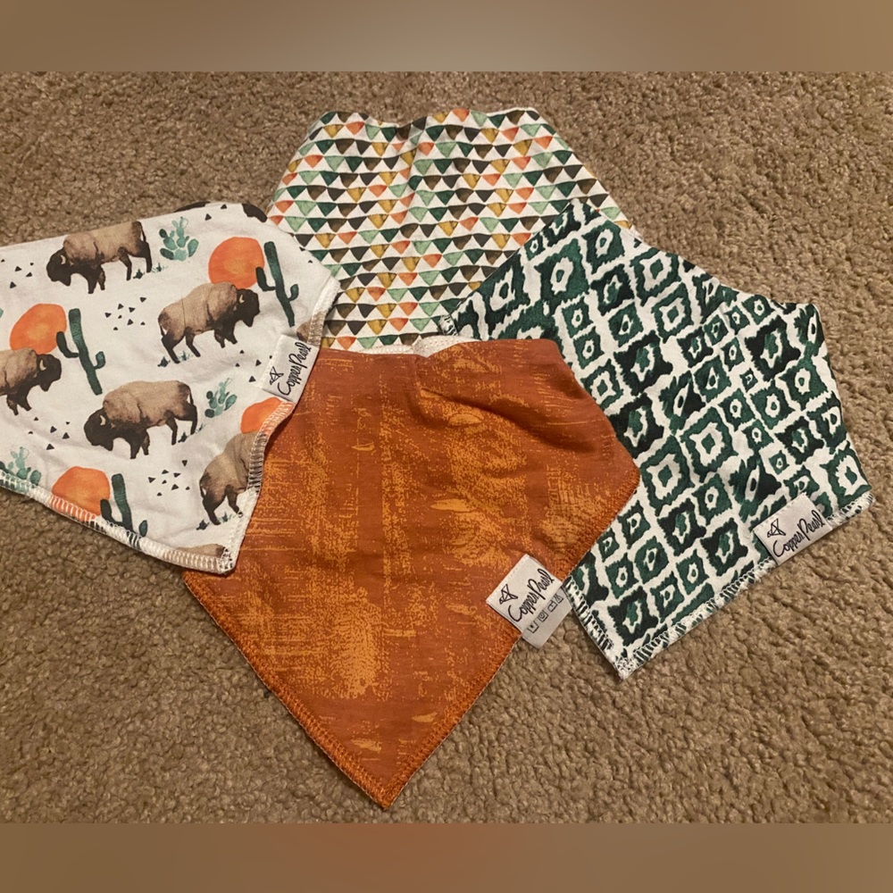 4 brand new western copper Pearl baby bibs